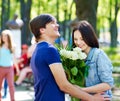 Couple of teenager on date outdoor.