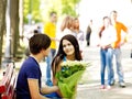 Couple of teenager on date outdoor.