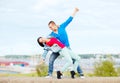 Couple of teenagers dancing outside Royalty Free Stock Photo