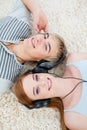 Couple of teenagers listening to music Royalty Free Stock Photo