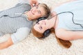 Couple of teenagers listening to music Royalty Free Stock Photo