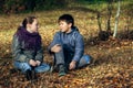 Couple of teenagers meet romantically in the autumn Park.