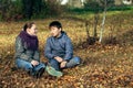 Couple of teenagers meet romantically in a Park.