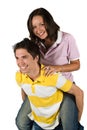 Couple of teenagers in piggyback Royalty Free Stock Photo