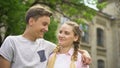 Couple of teens making selfie, first kiss, feelings of embarrassment, pure love