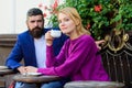 Couple terrace drinking coffee. Casual meet acquaintance public place. Meeting people first date. Strangers meet become Royalty Free Stock Photo