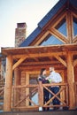 Couple on terrace of house