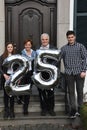 Family celebrating the 25th marriage anniversary of the parents Royalty Free Stock Photo