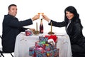 Couple toast with champagne at Christmas dinner