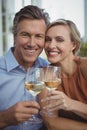 Couple toasting glasses of wine in restaurant Royalty Free Stock Photo