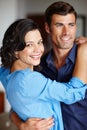 Couple, together and happy hug in portrait for love, romance and memories. Man, woman and intimate embrace for Royalty Free Stock Photo