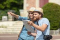 couple tourist backpackers looking for direction while traveling