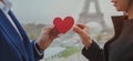 Couple of tourist near Eiffel Tower in Paris, honeymoon, love heart Royalty Free Stock Photo