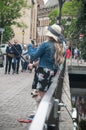 Couple of tourist taking a selfy picture on bridge in little Venise quarter in Colmar