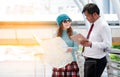 Couple of tourists consulting a city guide searching locations i Royalty Free Stock Photo