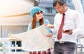 Couple of tourists consulting a city guide searching locations Royalty Free Stock Photo