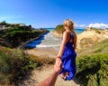 Couple of tourists holding hands at Canal D'Amour, Sidari, Corfu