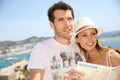 Couple of tourists with map travelling Royalty Free Stock Photo