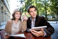 Couple of tourists sitting in coffee shop