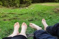 A couple of tourists slept and relaxed lying on the grass Royalty Free Stock Photo