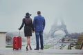 Couple of tourists travel to Paris, romantic honeymoon trip to France