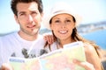 Couple of tourists visiting reading map Royalty Free Stock Photo