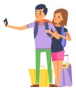 Couple with travel bags making selfie. Family vacation