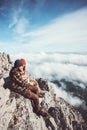 Couple travelers Man and Woman sitting on rocks Royalty Free Stock Photo