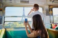 Couple traveling in subway train with view to the Eiffel tower Royalty Free Stock Photo