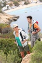 Couple of trekkers hiking on islands