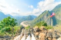 Couple trekking boot on mountain top at Nong Khiaw panoramic view over Nam Ou River valley Laos travel destination in South East