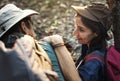 Couple trekking together into the forest Royalty Free Stock Photo