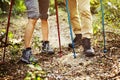 Couple trekking together into the forest Royalty Free Stock Photo