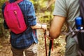 Couple trekking together in forest Royalty Free Stock Photo