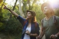 Couple trekking together in the jungle