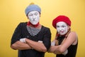 Couple of two funny mimes isolated on background