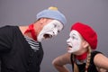 Couple of two funny mimes isolated on background