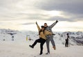 Couple of two young Latinos jumping in the Pyrenees