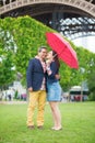 Couple under red umbrella Royalty Free Stock Photo