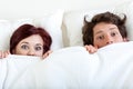 Couple under the sheet Royalty Free Stock Photo