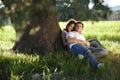 Couple under tree