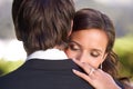 Couple, union and embrace on wedding day for love, support and together for marriage and commitment. People, romance and