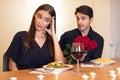 Couple On Unsuccessful Blind Date In Restaurant