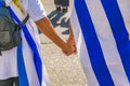 Couple With Uruguayan Flag Holding Hands, Montevideo, Uruguay