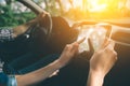 Couple using gps on tablet compter to navigate in car on holiday Royalty Free Stock Photo