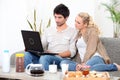 Couple using a laptop Royalty Free Stock Photo