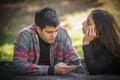 Couple using mobile smartphones. Emotional isolation and technology depression