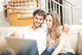 Couple using a notebook Royalty Free Stock Photo