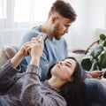 Couple using smart phones on a couch Royalty Free Stock Photo