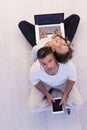 Couple using tablet and laptop computers top view Royalty Free Stock Photo